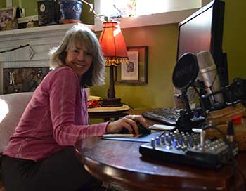 Sitting at the computer desk