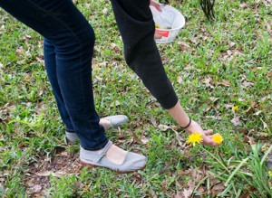 Melissa picks dandelions