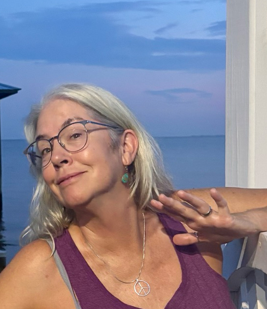 Jean Campbel in front of the bay in Coden, Alabama.